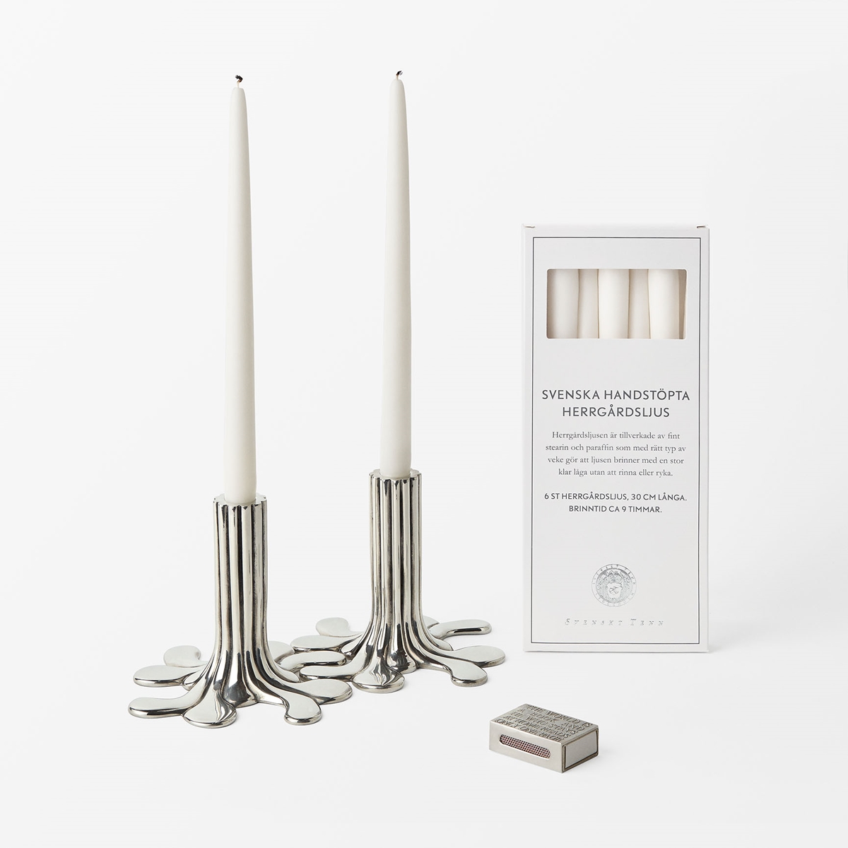 Two Candle Holder Flow with Matchbox and Candle - Svenskt Tenn Online